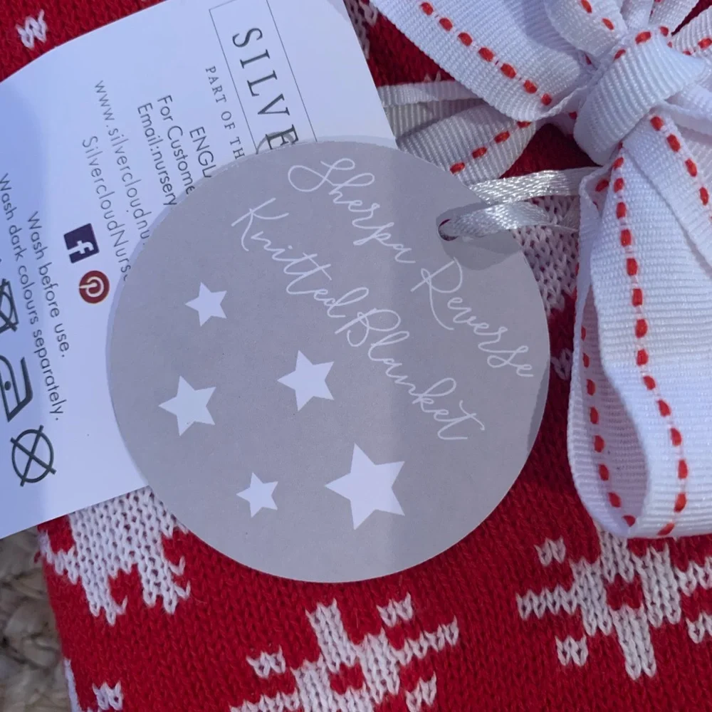 Red Holiday Blanket with White Reindeer Pattern kids